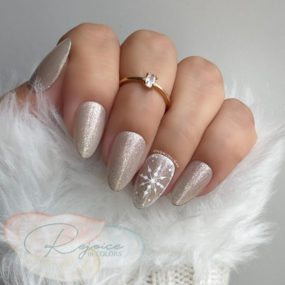 Gold Nail with one snowflake design on the hand