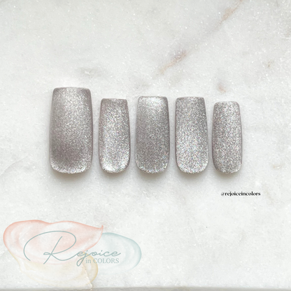 Silver Cateye nail set on Tile